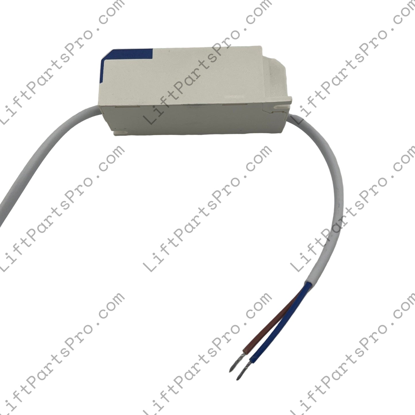 Small electronic component with wires on a white background