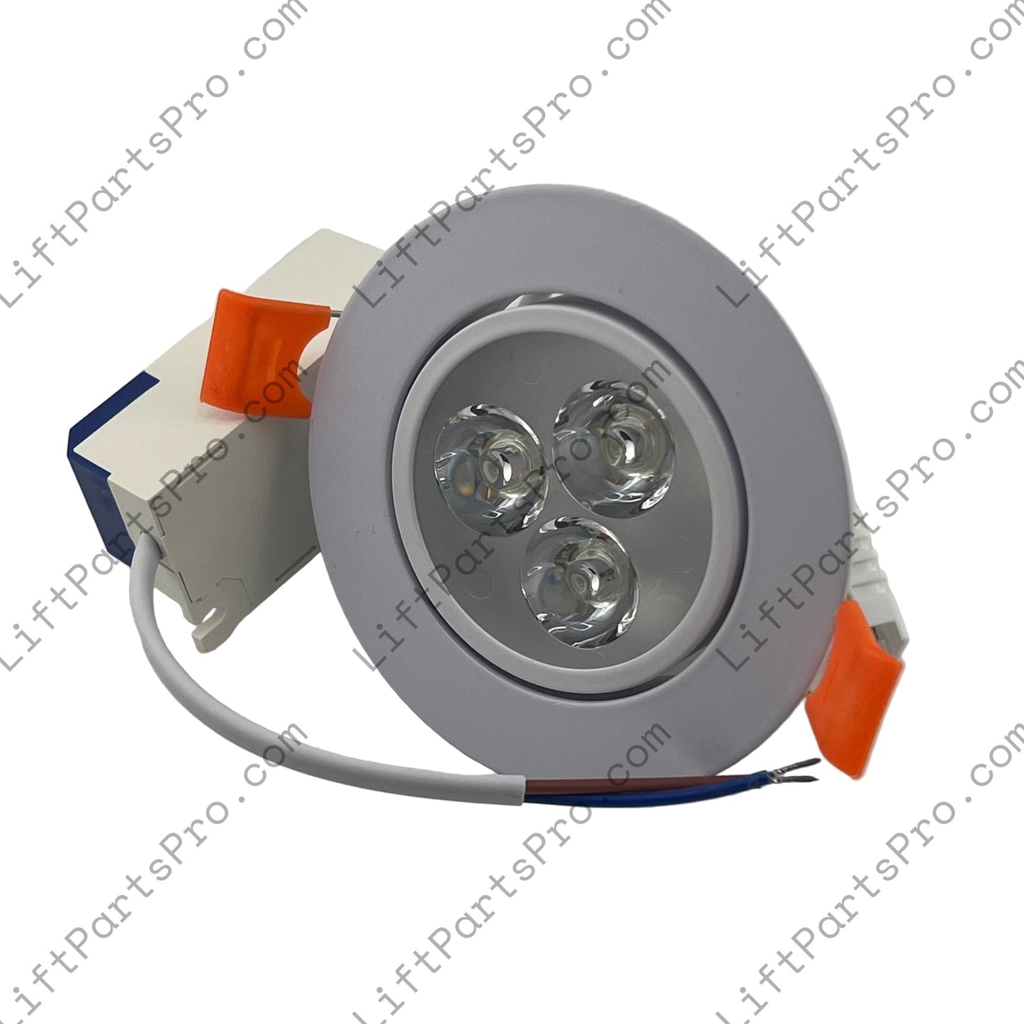 Close-up of a recessed ceiling light fixture on a white background