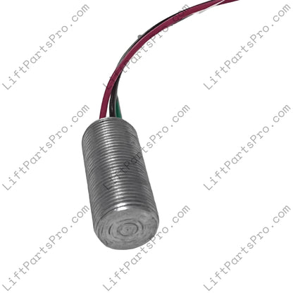 Metallic cylindrical sensor with wires on a white background