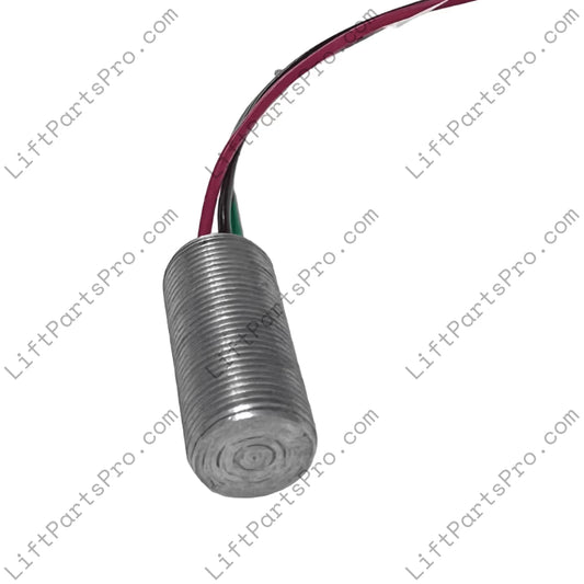 Metallic cylindrical sensor with wires on a white background