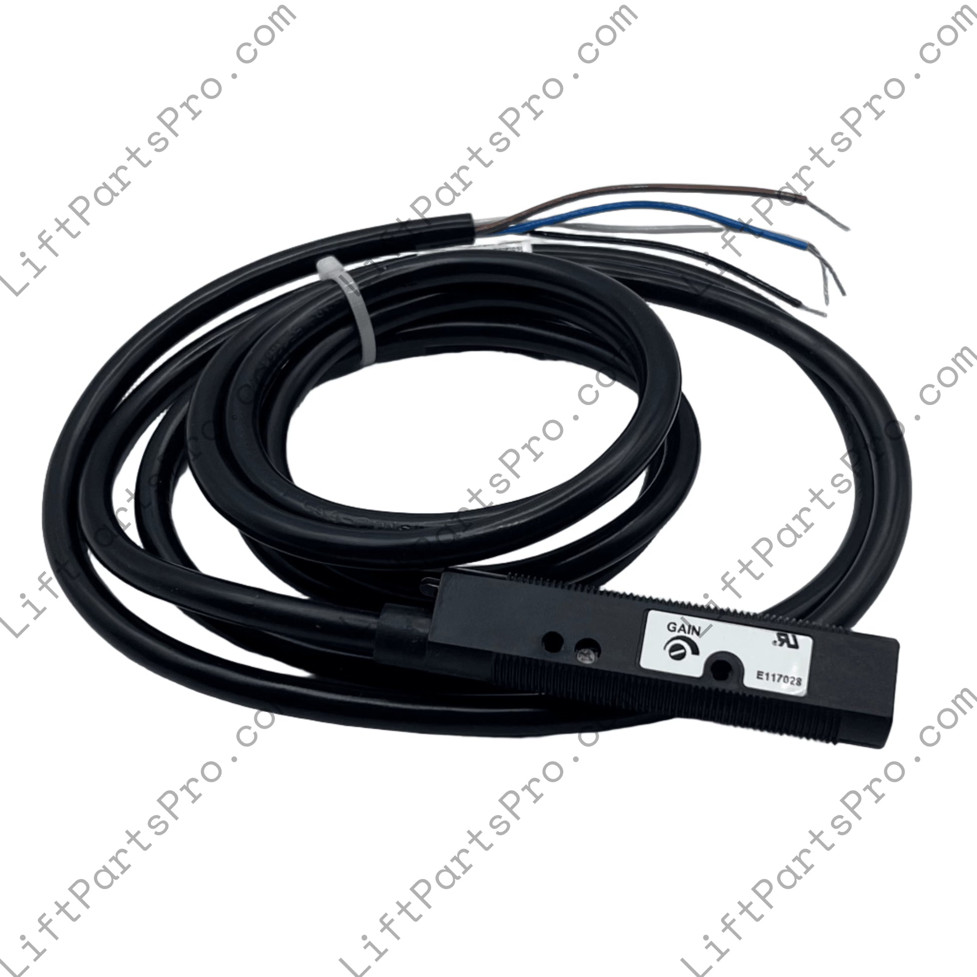 Black sensor with coiled cable on a light gray background